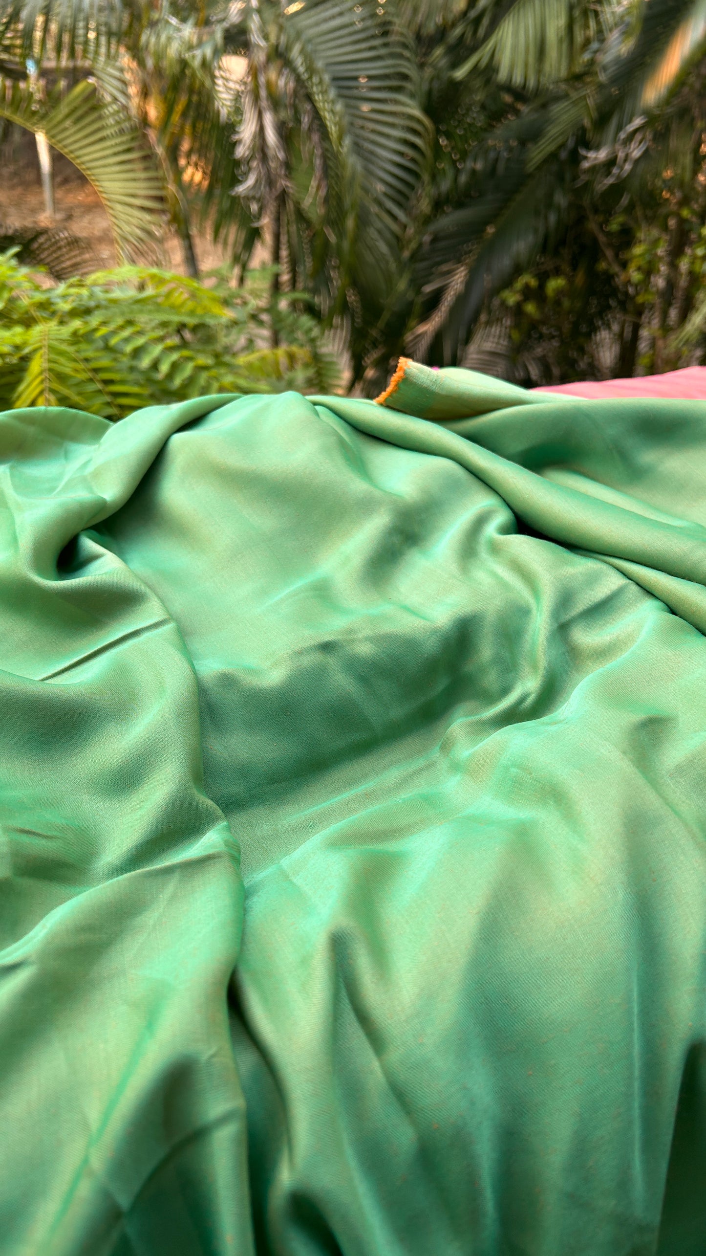 Back view of the Teal Green and Mango Yellow Reversible Saree showcasing its stylish design and versatility.