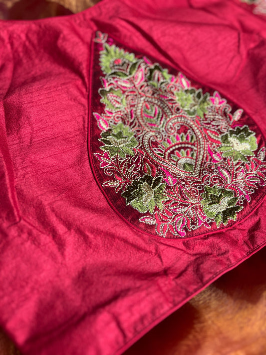 Close-up view of the soft fabric texture of the Cherry Blooms Embroidered Blouse, showcasing its quality and comfort
