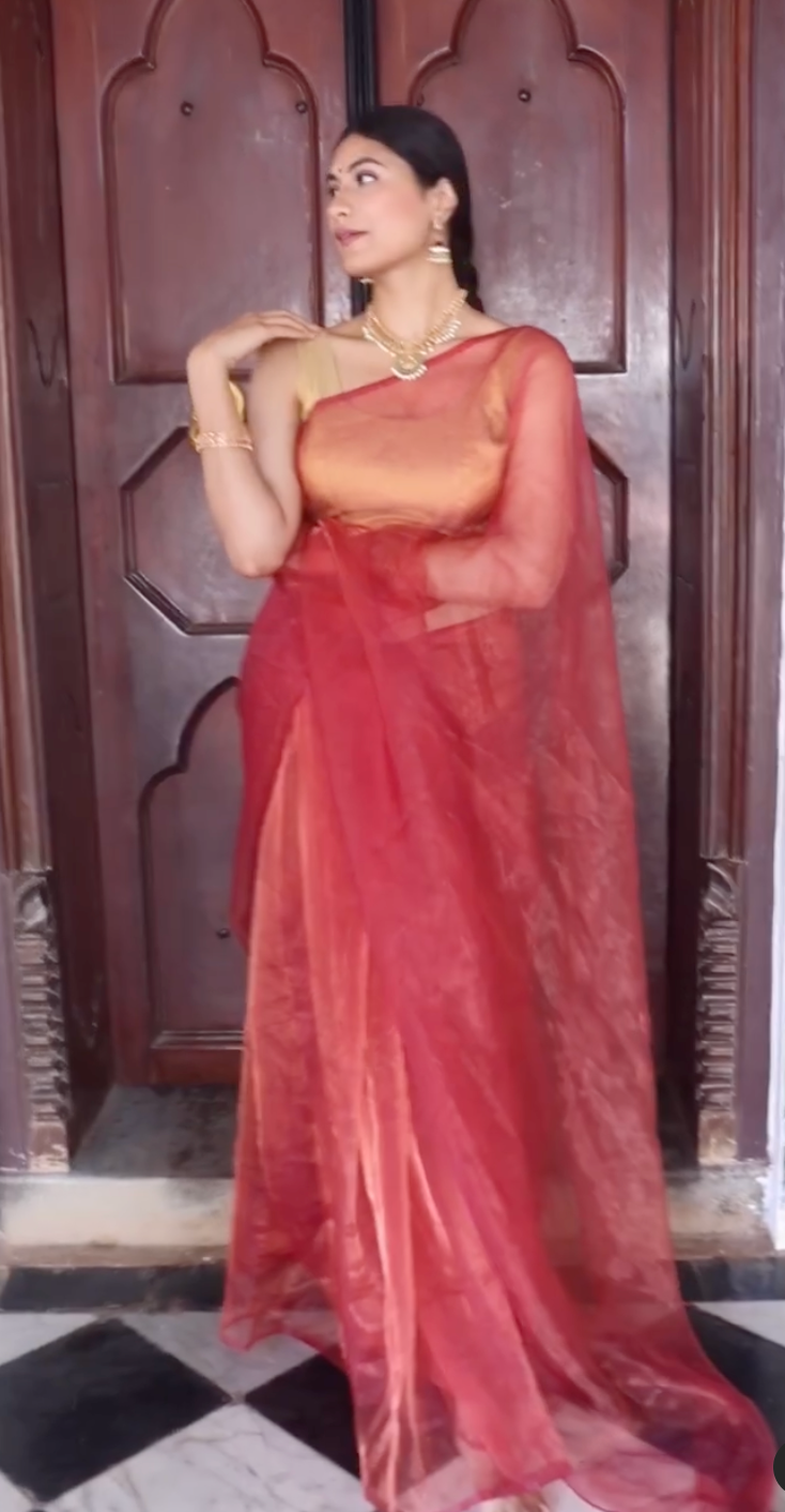 Neatly folded Honeywine Organza Saree, ready for storage or travel, showcasing its compact design