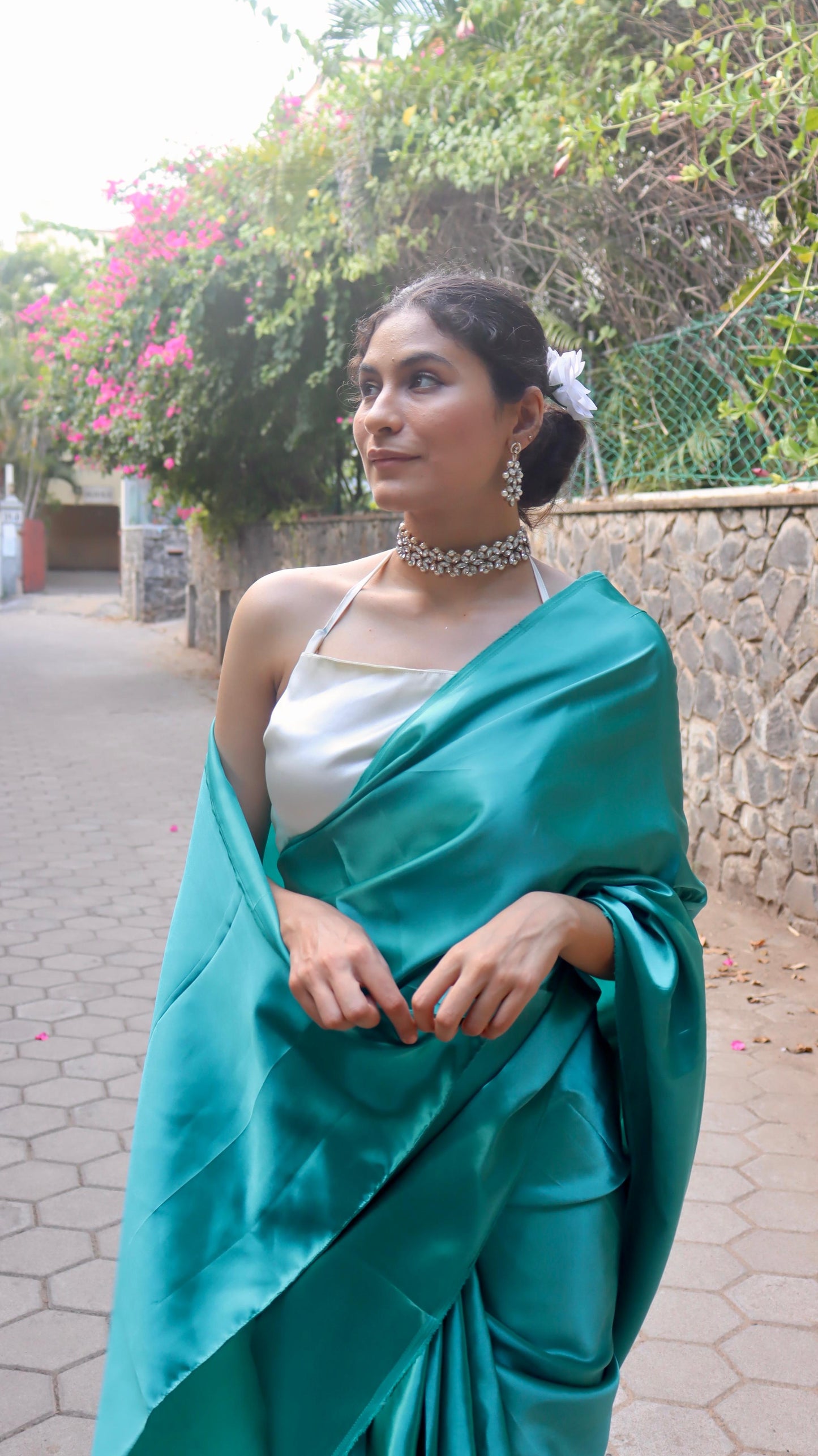 Image showing a woman wearing a blue satin saree