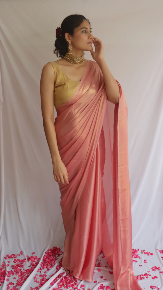Elegant Rosy Pink Shimmer Saree displayed beautifully, showcasing its luxurious shimmer and vibrant color.