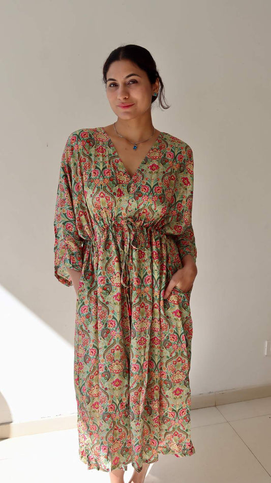 Close-up of the deep side pocket on the Meadow Paisley Crepe Dress, showcasing its practical everyday design and soft fabric drape.