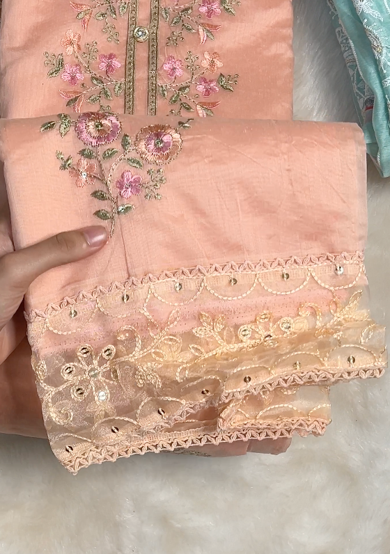 Swatch of the Fully Worked Unique Organza fabric showing its texture and intricate design details.