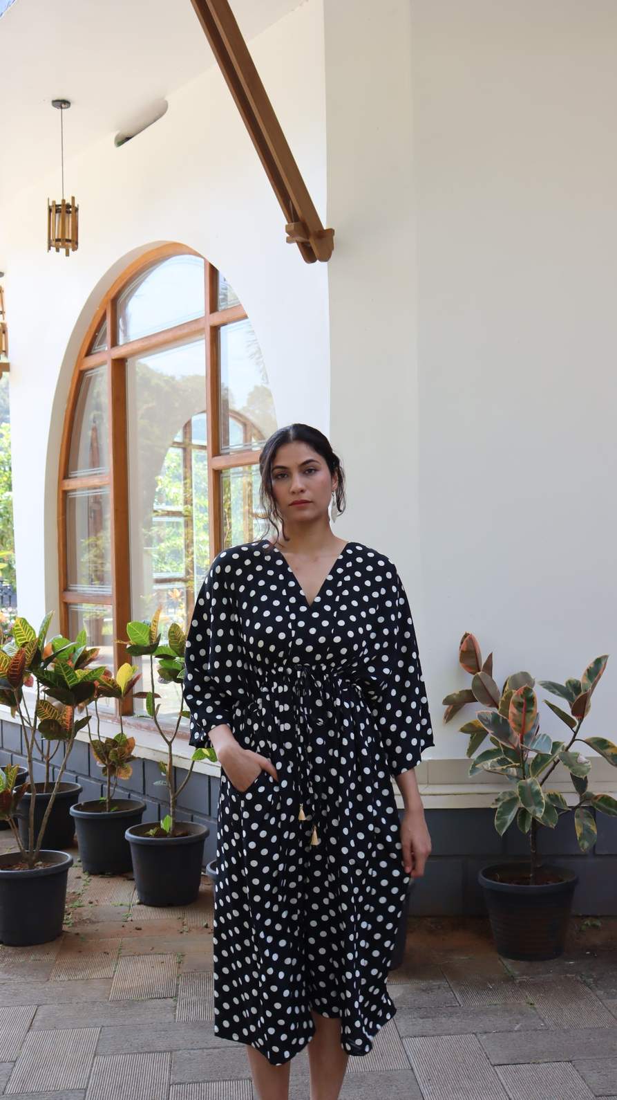 Side pocket detail of satin polka dot free size dress