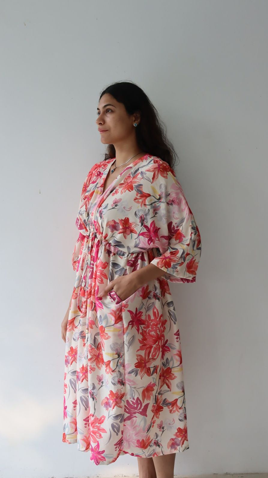 Side pocket detail of large floral rayon free size dress