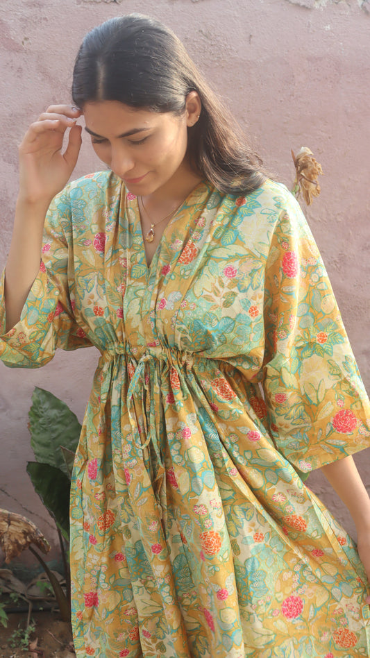 A Misty Evening Free Size Dress in soft colors with massive pockets, showcasing its elegant design and flowing silhouette, ideal for casual outings