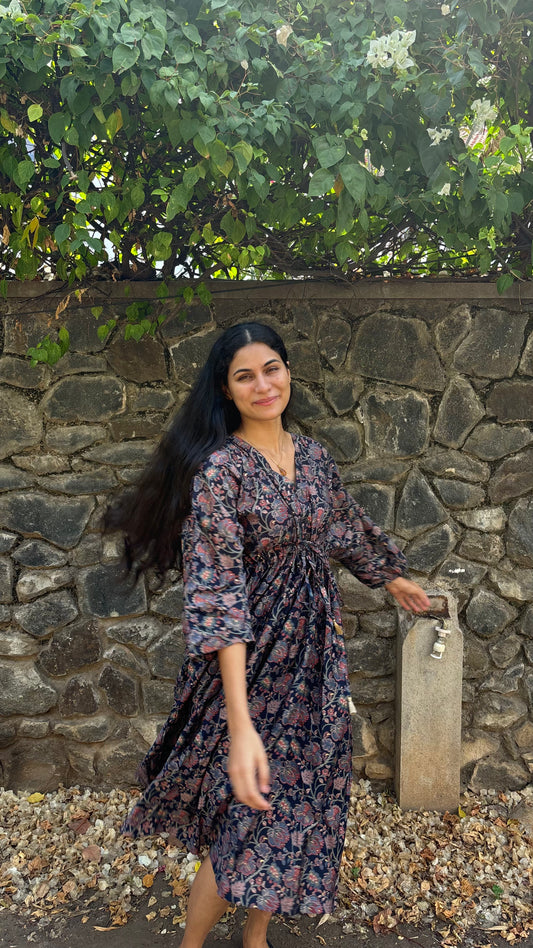 An Artful Attire Free Size Dress showcasing a unique pattern and vibrant colors, ideal for casual outings and special occasions.