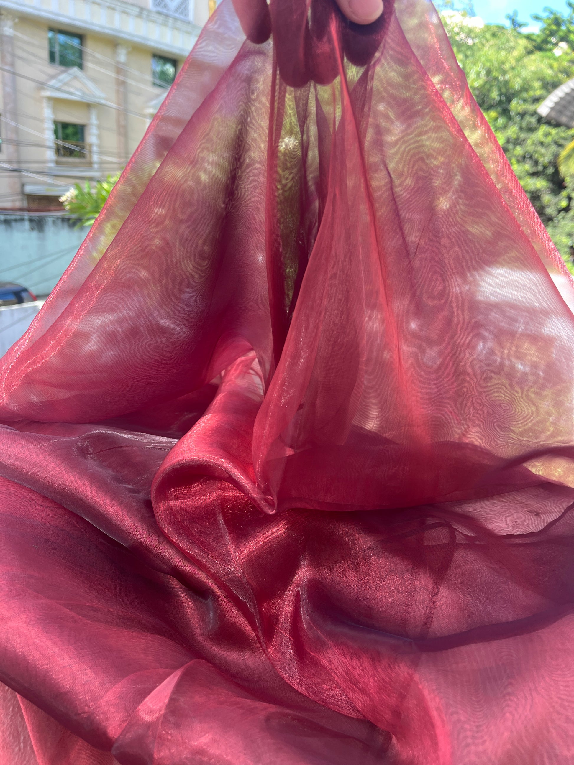 Detailed view of the soft texture of Blood Red saree blouse material, highlighting its quality and elegance.