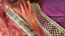 Close-up of Luxury Empress Saree with intricate patterns and colors