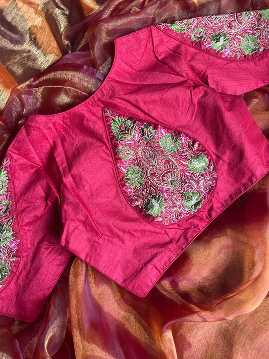 The Cherry Blooms Embroidered Blouse displayed beautifully, showcasing its intricate floral embroidery and elegant design, ideal for festive occasions.