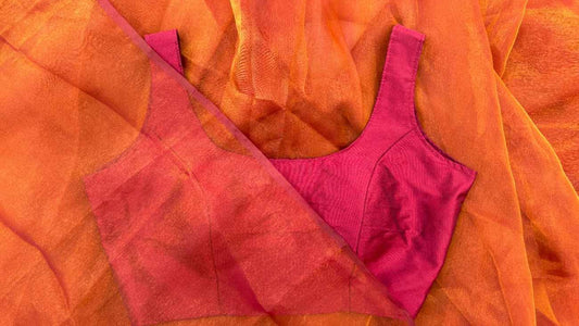 Detailed close-up of Label Anaira’s Maroon Grace Blouse fabric showing the rich maroon silk blend texture with subtle shine. The material is comfortable, breathable, and perfect for pairing with organza, silk, or cotton sarees.