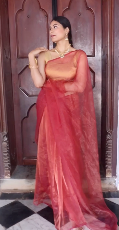 Neatly folded Honeywine Organza Saree, ready for storage or travel, showcasing its compact design
