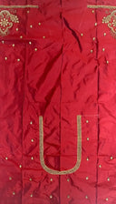 Red fabric with gold embroidery and embellishments