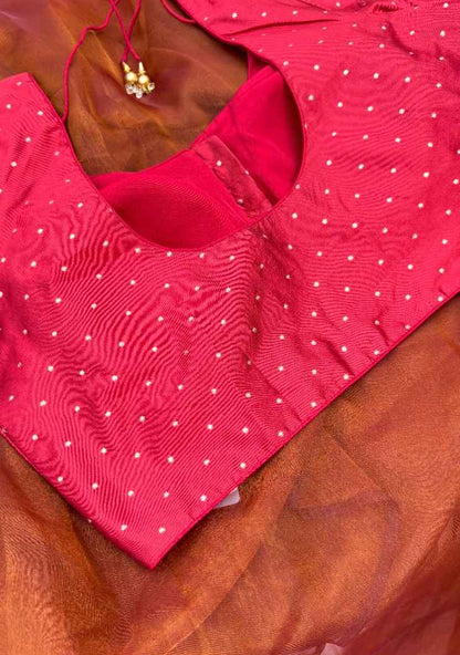 Back view of the Sindoor Gold Polka Blouse featuring adjustable dori tie-up closure. The rich red fabric with gold polka embroidery allows a customizable fit while maintaining elegance for weddings, parties, and festive gathering