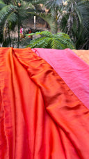 Sunset Reversible Saree Fabric Close up outdoors with a blurred natural background