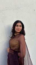 Portrait view of the Duchess After Dark Wine Organza Saree by Label Anaira showcasing the elegant sheer organza fabric and rich wine colour.