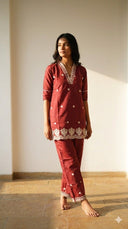 Full view of rust co-ord set with embroidered kurta and straight pants