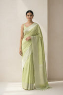 Harit Aabha banarasi semi katan silk saree in soft pistachio green with traditional woven motifs