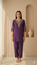 Imperial Violet embroidered kurta set with detailed neckline and straight pants