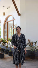 Side pocket detail of satin polka dot free size dress