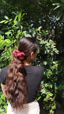 Blood Red organza scrunchie in a low ponytail