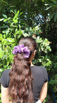 Lavender organza scrunchie in a low ponytail