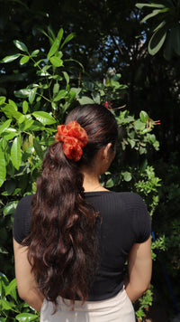 OG Honey Queen Bee organza scrunchie in a low ponytail