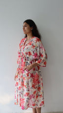 Side pocket detail of large floral rayon free size dress