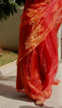 Close view of Queen Bee Honey Organza Saree pleats and golden shimmer detail — luxury semi-organza saree, Label Anaira