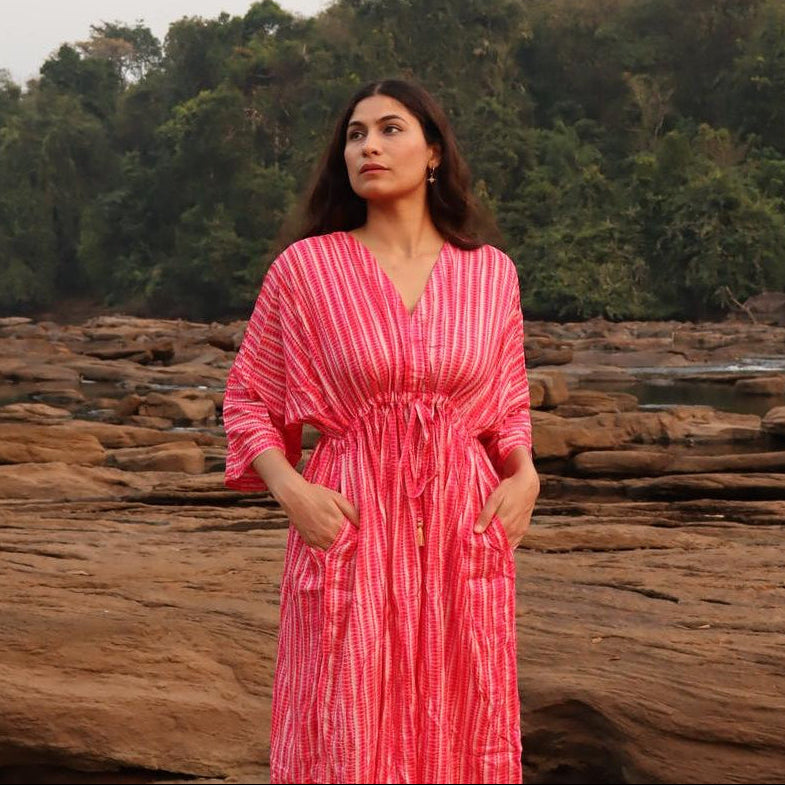 Side pocket detail of warm pink rayon free size dress